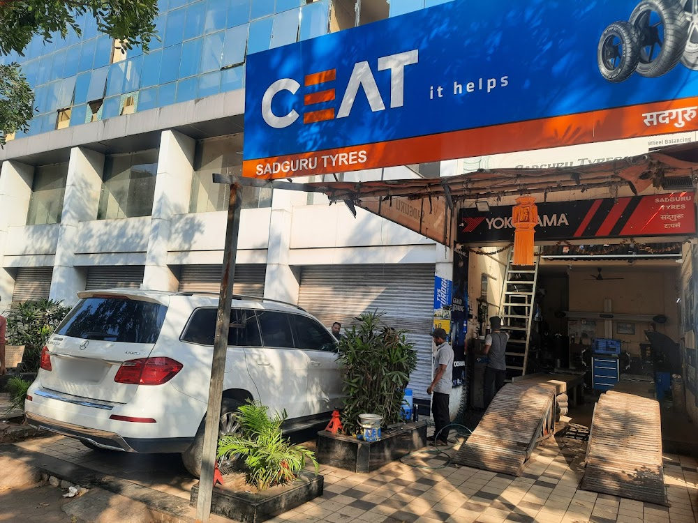 Sadguru Tyres shopfront with CEAT signboard
