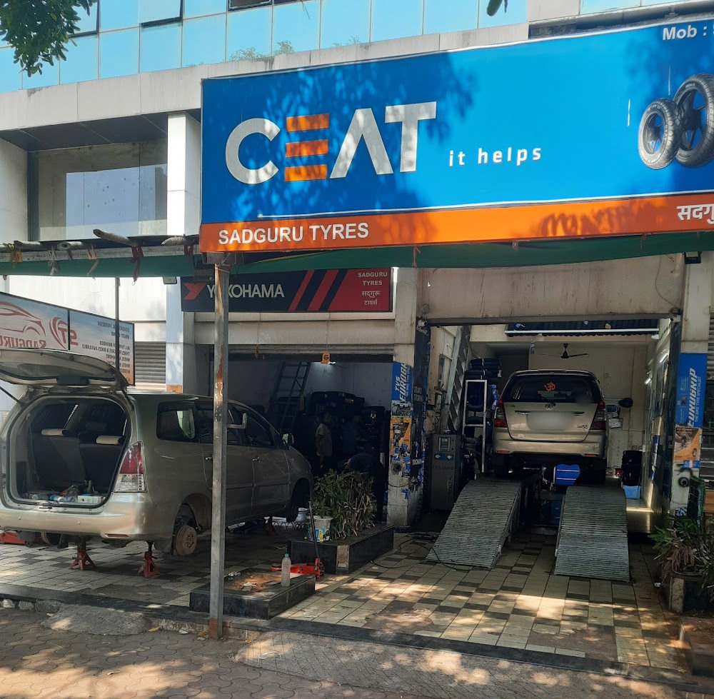 Service bays under the CEAT signboard