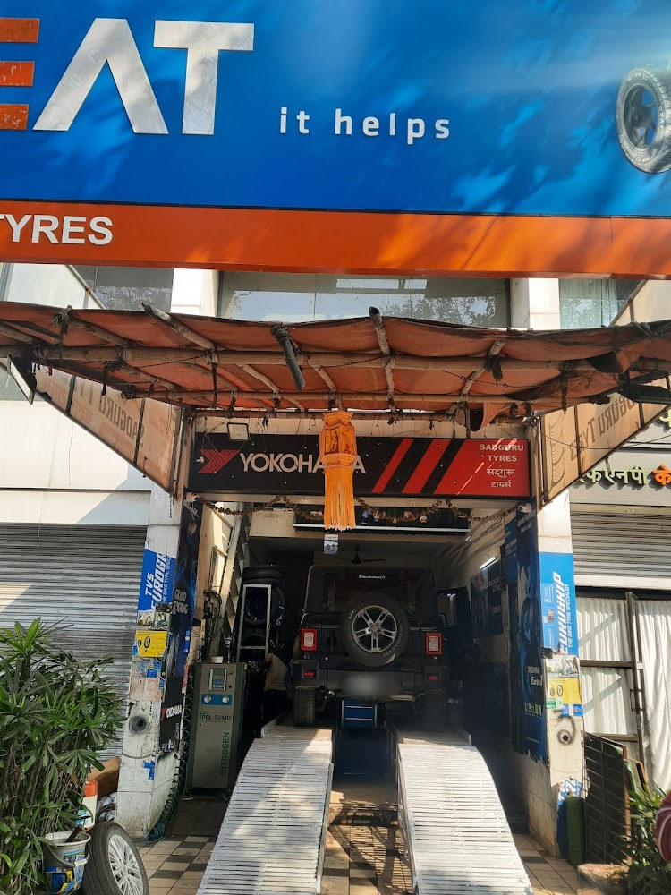 Tyre bay under the CEAT Sadguru Tyres sign