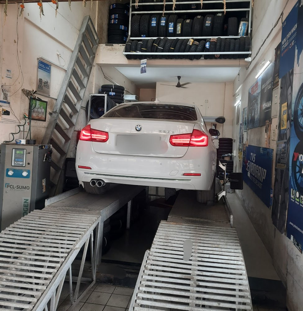 BMW sedan on the alignment ramps