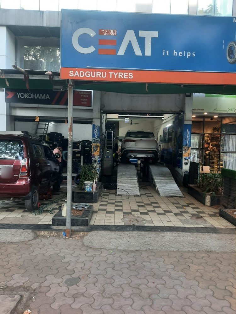 Wide view of the Sadguru Tyres service bays